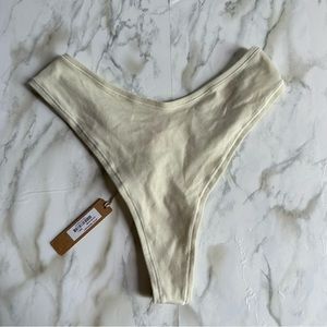 NWT- Skims Women COTTON Jersey DIPPED THONG in Bone / Size L (PN-DTH-0271)